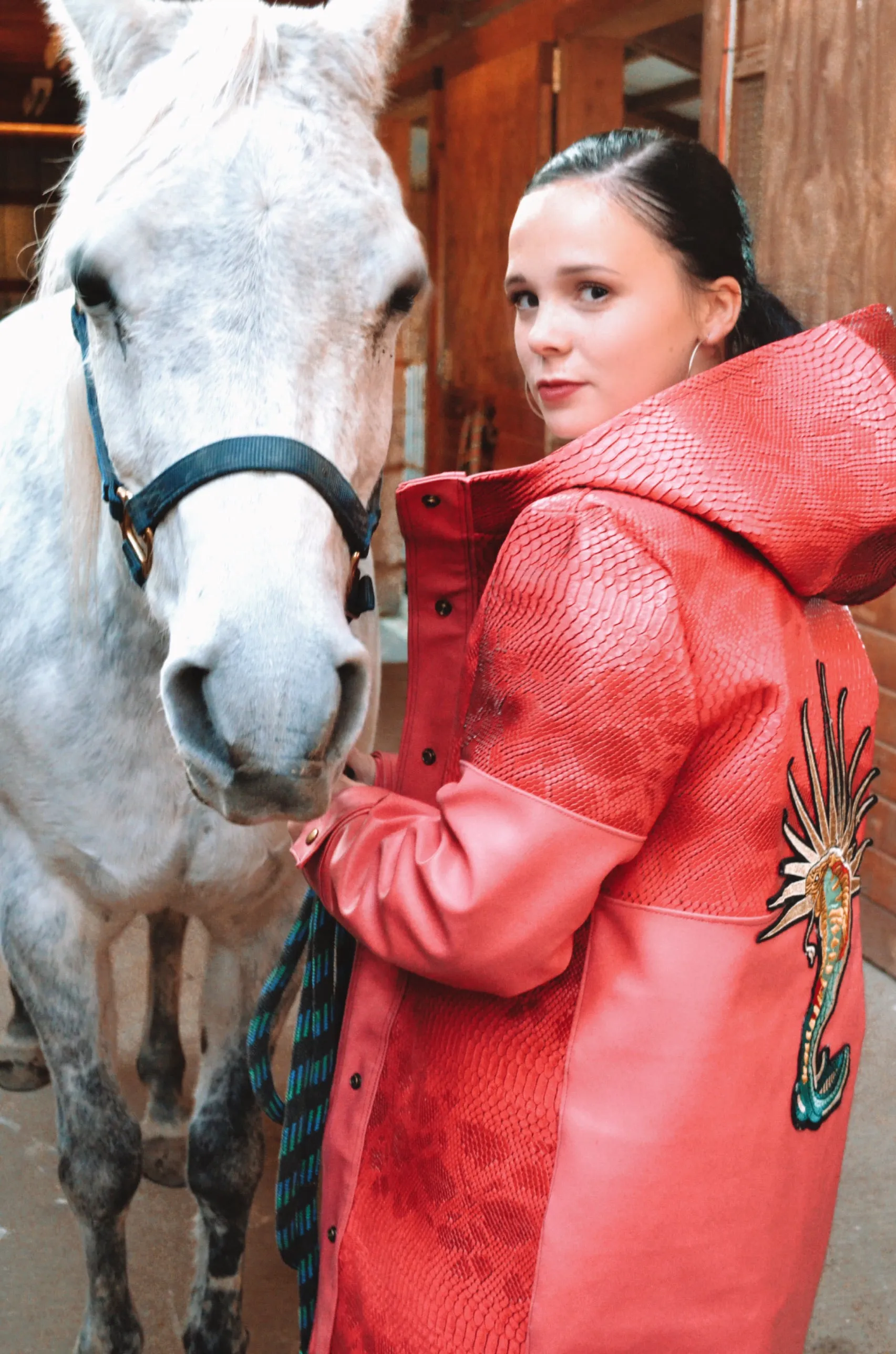 Pink vinyl snake skin rain coat